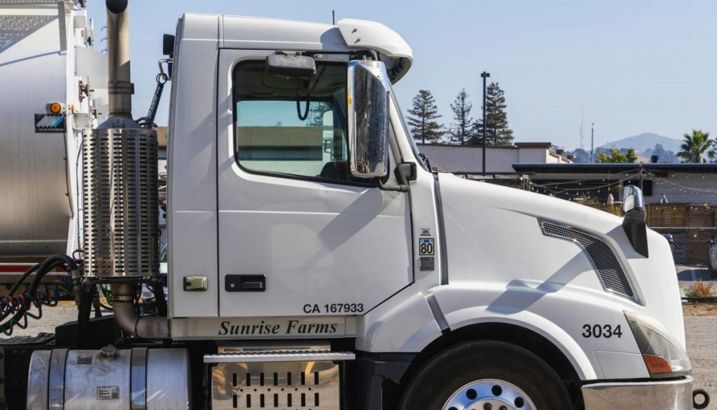 Illustration of a powerful diesel truck showcasing performance-enhancing upgrades such as cold air intake, turbochargers, and heavy-duty suspension systems.